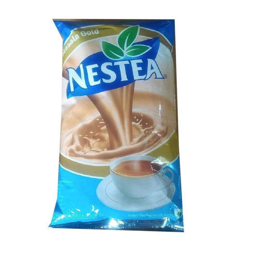 Nestea Masala Gold instant tea premix pack with creamy tea and cup image by Tea coffee vending service